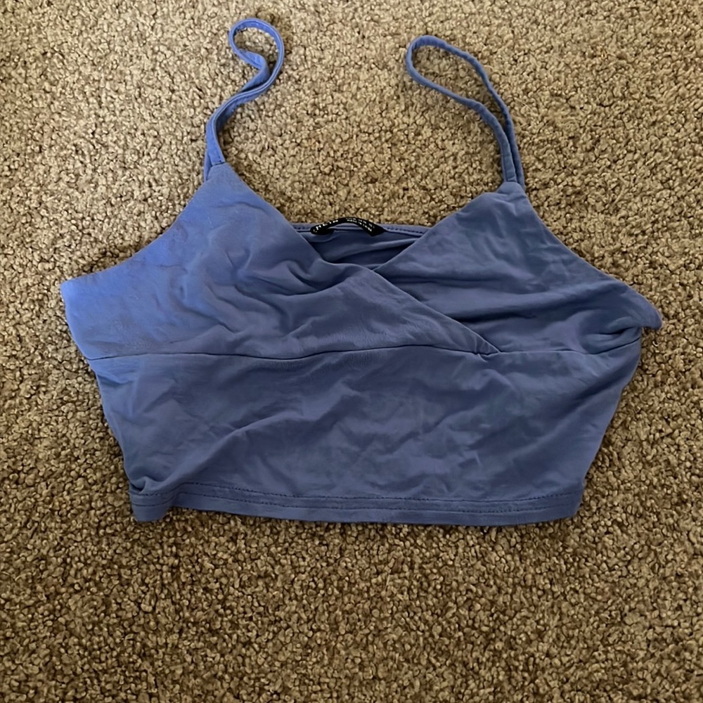 Cute purple cropped tank top with crossed design